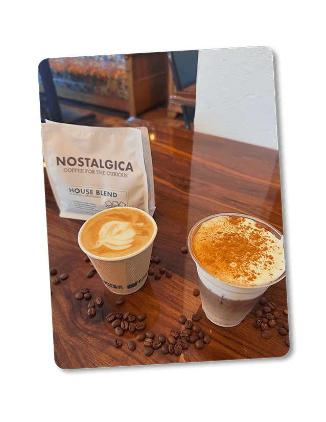 Delicious coffee drinks next to coffee beans