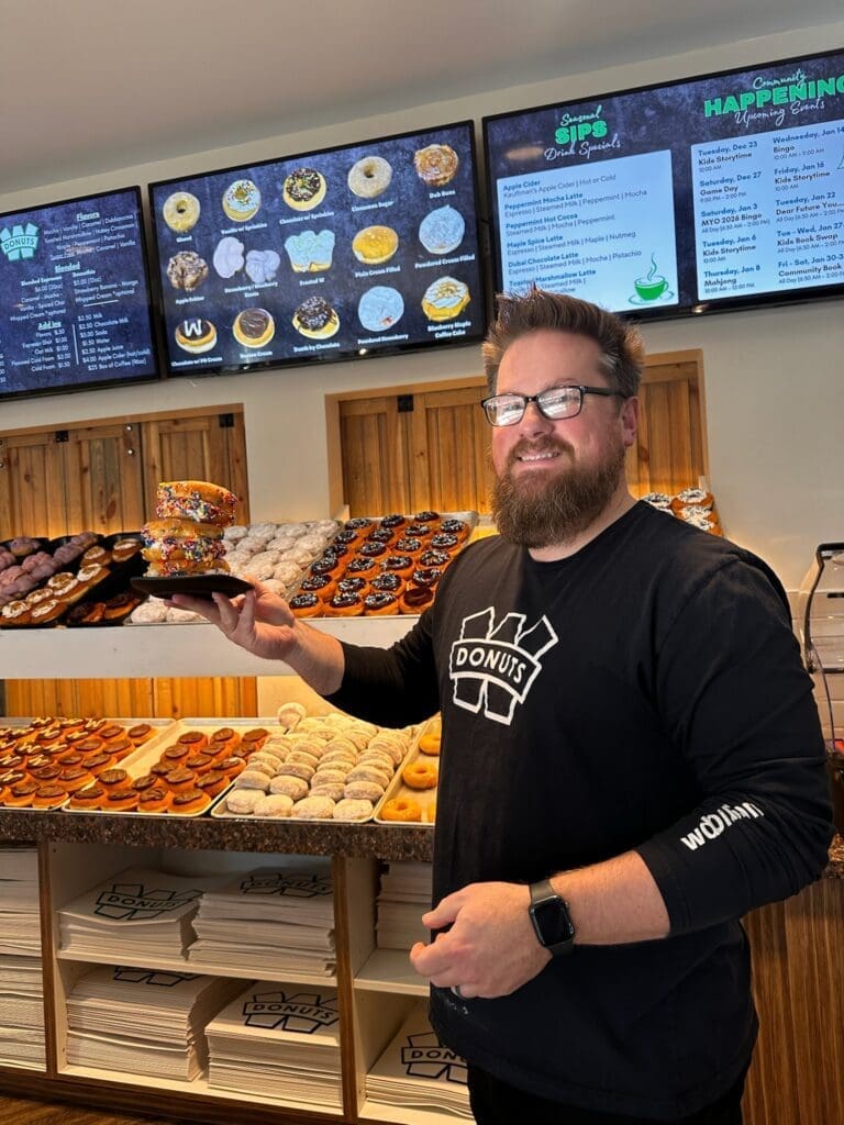 Manager Holding Ice Cream Donut sandwiches